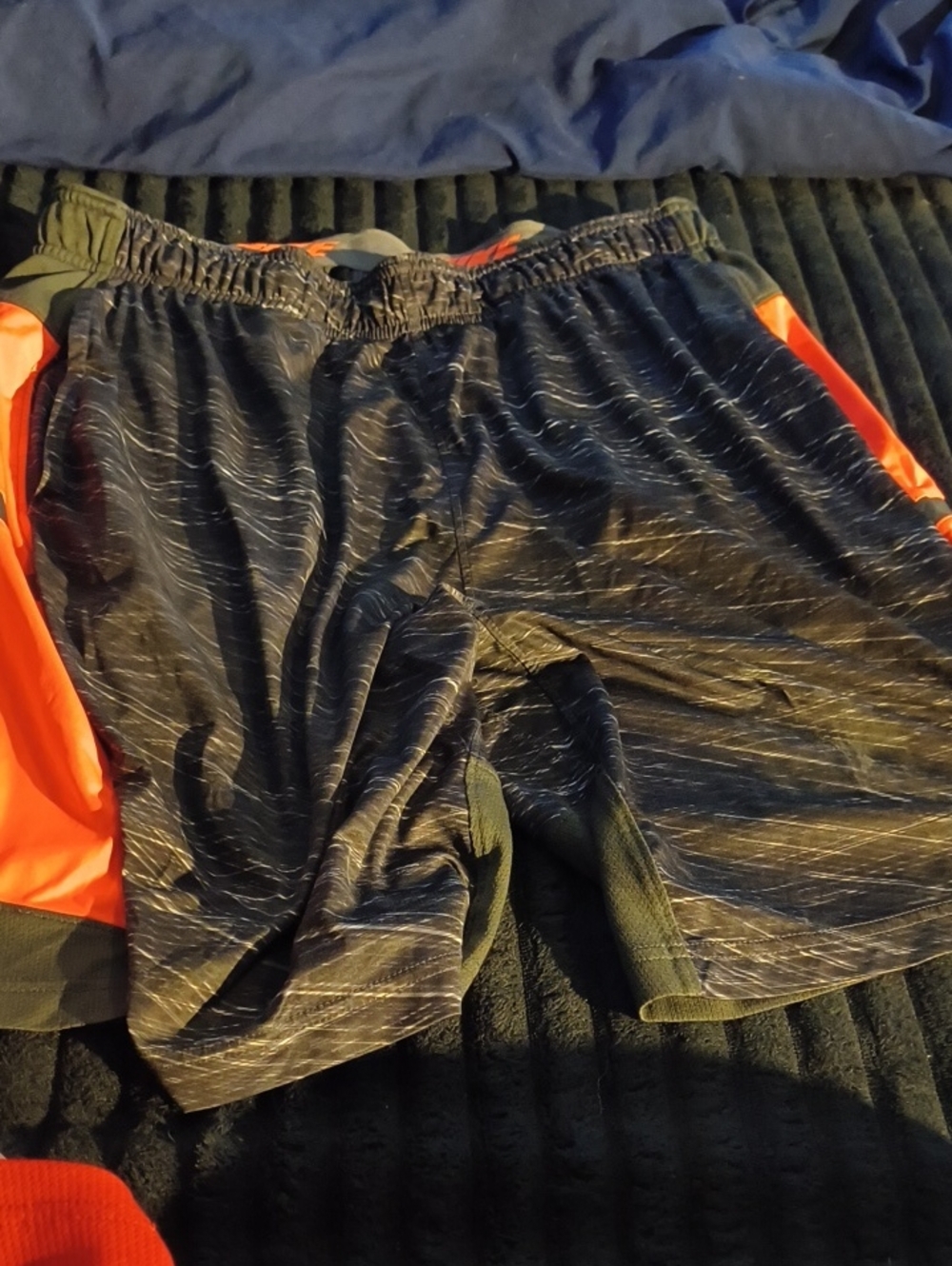 Nike Men's Black Athletic Shorts with Orange Panels